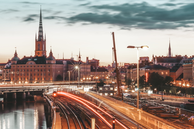 neon, dusk, travel destinations, street, nature, cloud - sky, transportation, cityscape, outdoors, building, rails, building exterior, water, town, sky