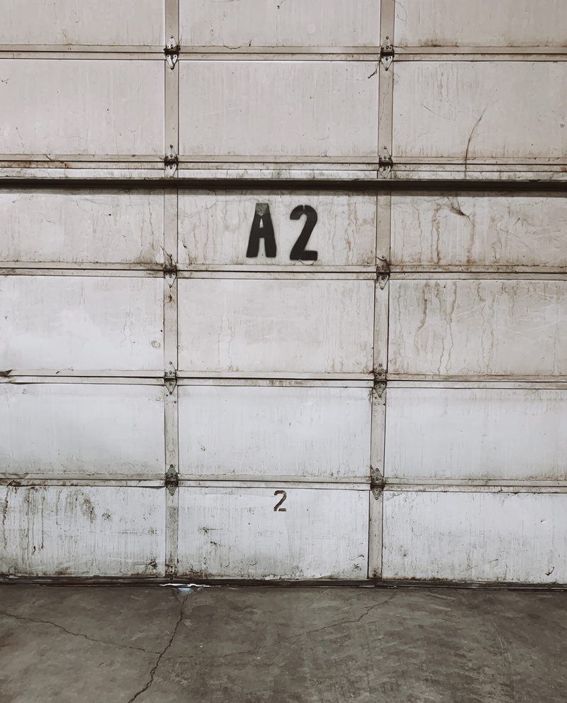 suit, coat, concrete, building exterior, number, text, day, built structure, flooring, door, 2K, apparel, garage, old, wood - material, wall, safety, pattern
