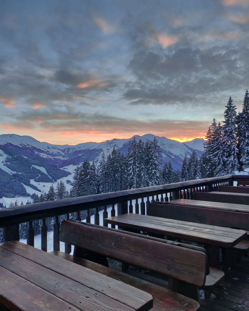 cold temperature, dock, snowcapped mountain, beauty in nature, built structure, water, nature, table, mountain range, tree, boardwalk, waterfront, tranquil scene