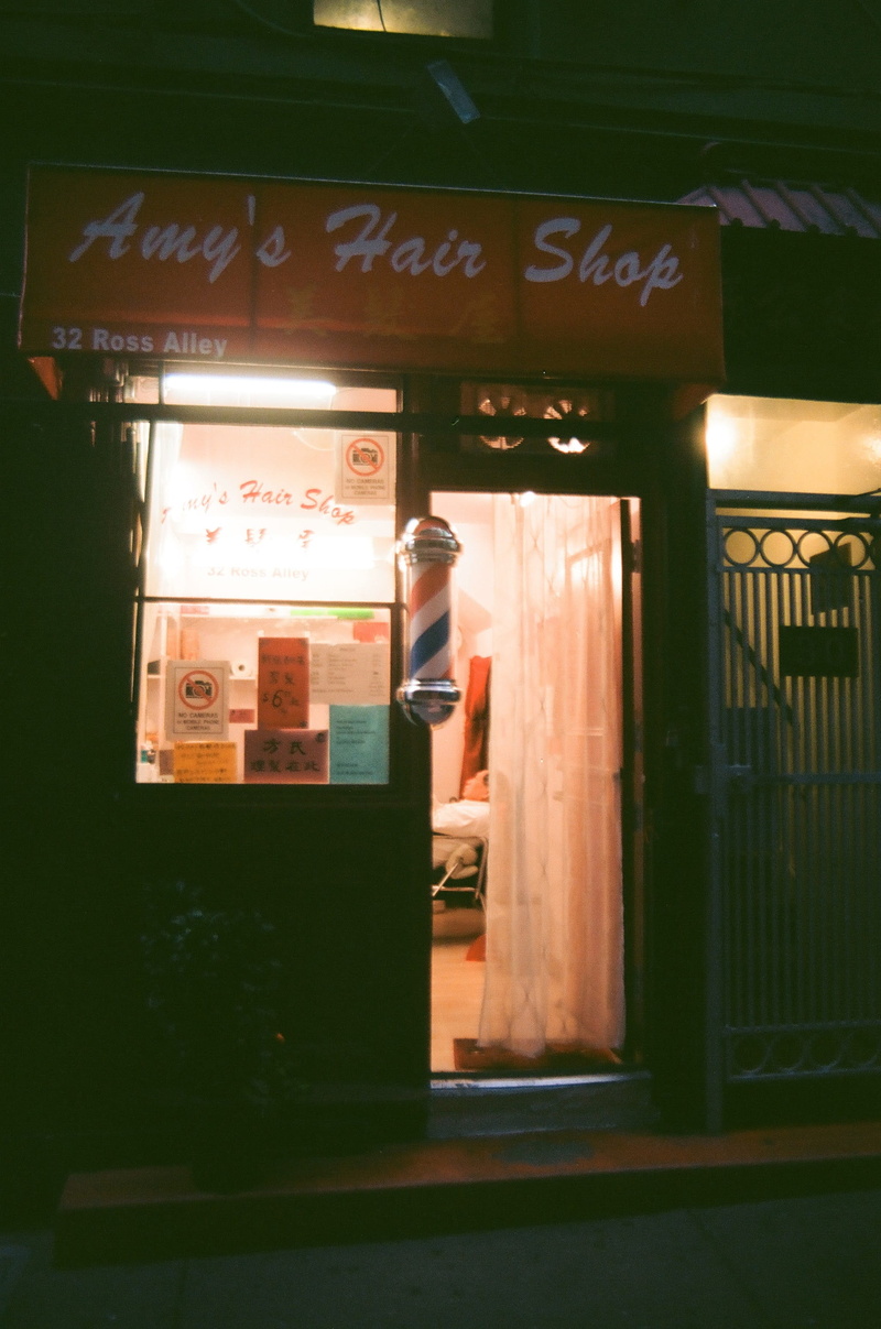 building exterior, postal office, script, laundry, restaurant, shop, door, communication, one person, gate, sliding door, standing, day, closet, food court