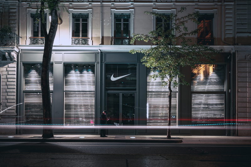 house, window, plant, front, nike, wooden, black, building exterior, real people, building, brown, door, clear, footpath, store, shop, glass, street, transportation