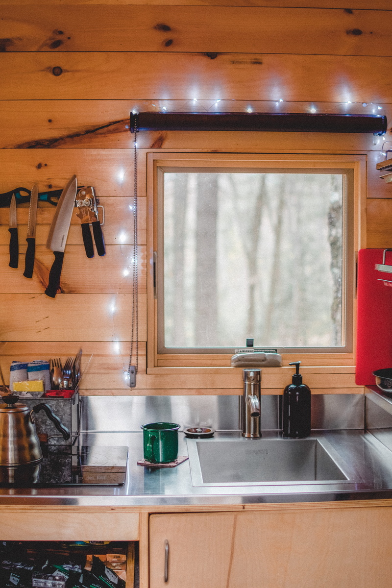 indoors, furniture, container, hardwood, wood, sink faucet, sink, kitchen, weaponry, domestic kitchen, home decor, domestic room, double sink, absence