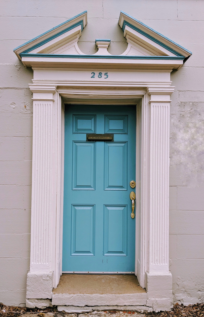 door, entrance, house, wall - building feature, vegetation, curtain, turquoise colored, folding door, architecture, shutter, brick, potted plant, safety