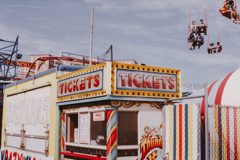 spoke, amusement park, fire department, western script, fire truck, restaurant, built structure, tire, transportation, arts culture and entertainment, nature