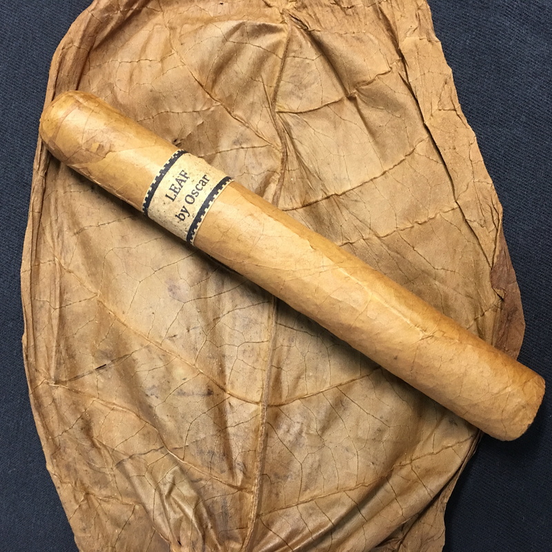 text, pattern, creativity, tobacco, cigar with leaf, baking, communication, bakery, food and drink, no people, 2K, brown, cigar, bread, still life, close-up