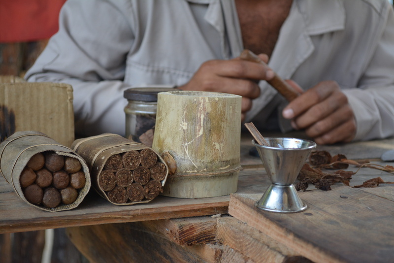 adult, men, indoors, preparing food, table, cigar, chef, hand, food and drink, wood - material, preparation, human hand, tobacco, real people, farm, travel