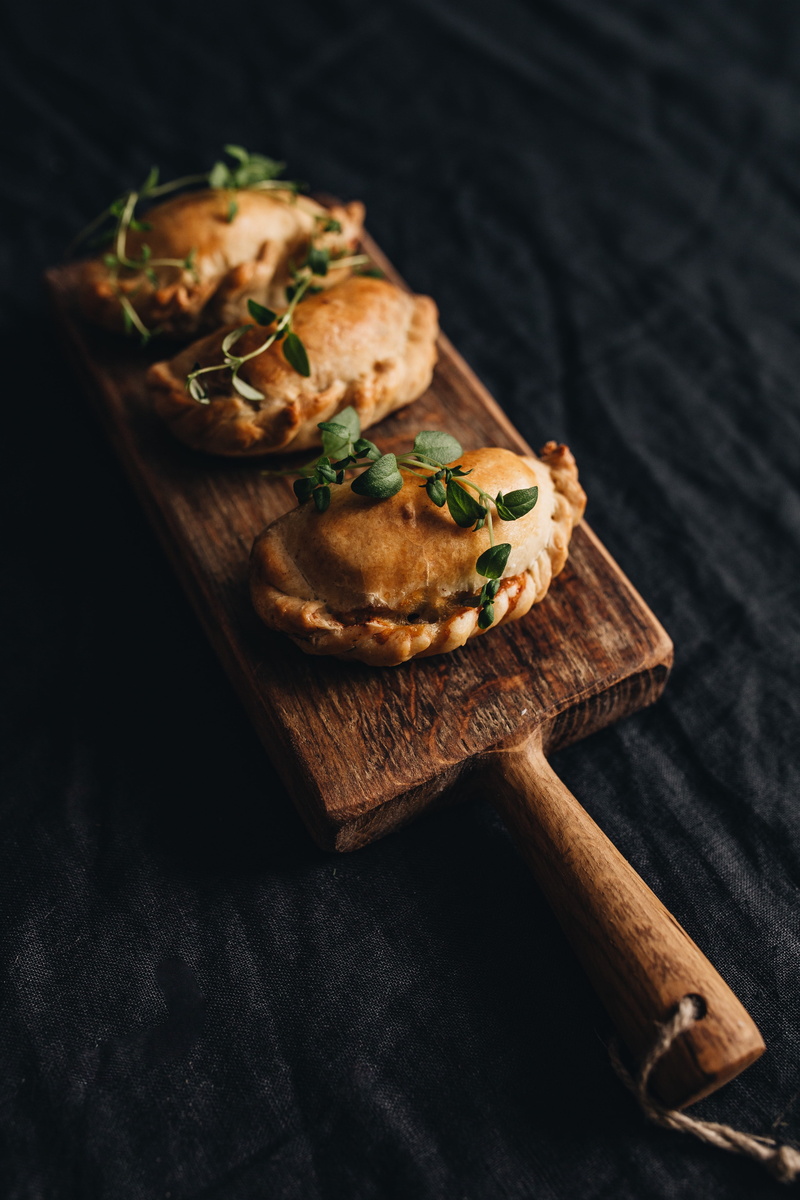 close-up, cutting board, polish food, vegetarian, high angle view, snack, healthy eating, dumpling, meal, food, pierogies, baked, 5K, black background