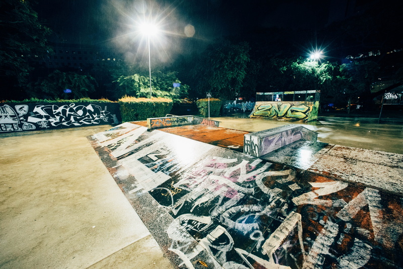 park - man made space, lens flare, cement, brick, built structure, plant, empty, skateboard park, seat, street, collage, grafitti, deck, street light, absence