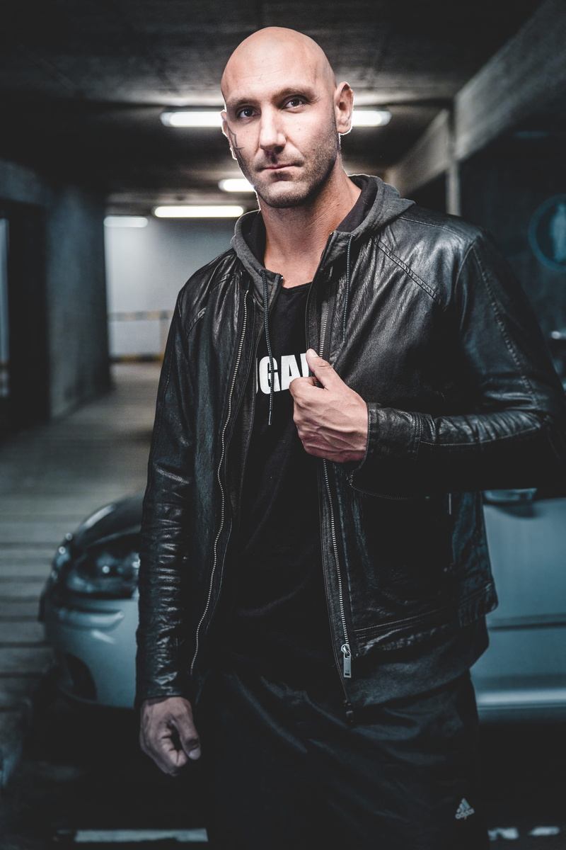 leather, casual clothing, indoors, jacket, mid adult, real people, outerwear, young adult, black, focus on foreground, males, 5K, looking at camera, clothing