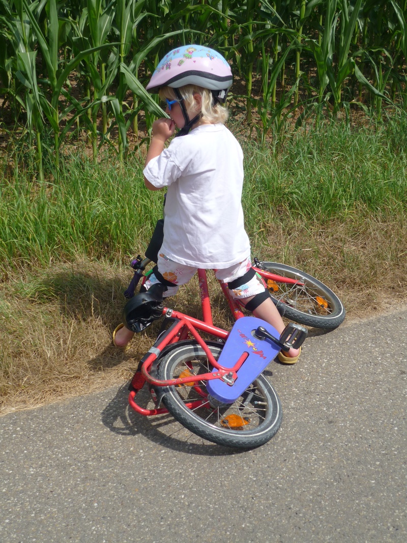 one person, casual clothing, men, bike ride, bicycle helmet, childhood, real people, land vehicle, failure, sunday, riding, headwear, fell down, red, boy