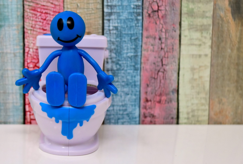 wall - building feature, plastic, indoors, still life, toilet bowl, toilet, funny, blue, male likeness, toy, session, wc, cute, close-up, focus on foreground