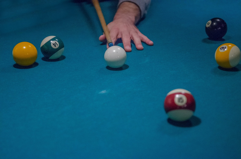 one person, billiards, table, sport, tail, sphere, pocket, french, skill, band, pool - cue sport, carpet, pool table, leisure activity, human hand, american