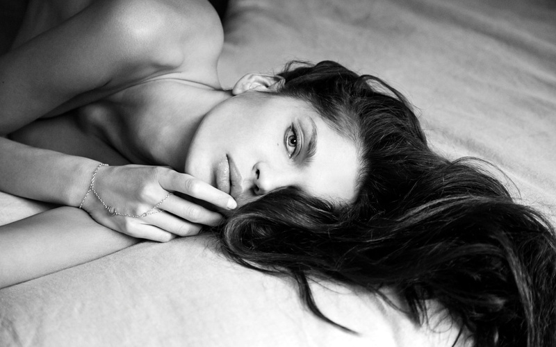 headshot, bed, young adult, hairstyle, indoors, hair, furniture, brunette, topless, lifestyles, relaxation, lying down, monochrome, looking at camera, woman