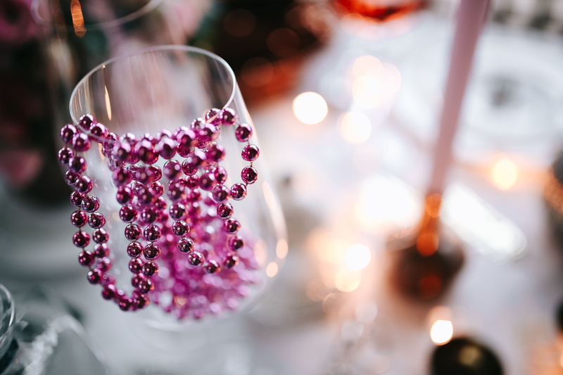 selective focus, decoration, table, luxury, illuminated, celebration, pink, no people, drinking glass, plant, focus on foreground, Christmas, day, 5K