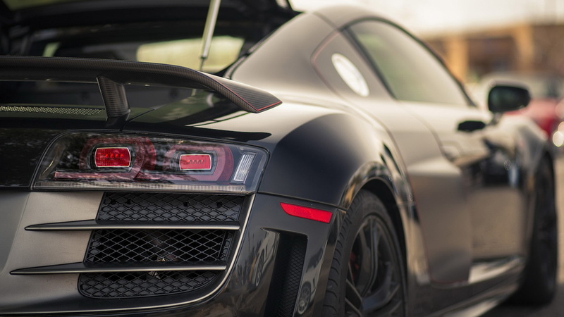 silver colored, outdoors, Audi R8, wealth, road, 1080P, speed, motor vehicle, no people, city, focus on foreground, tire, retail, land vehicle, travel