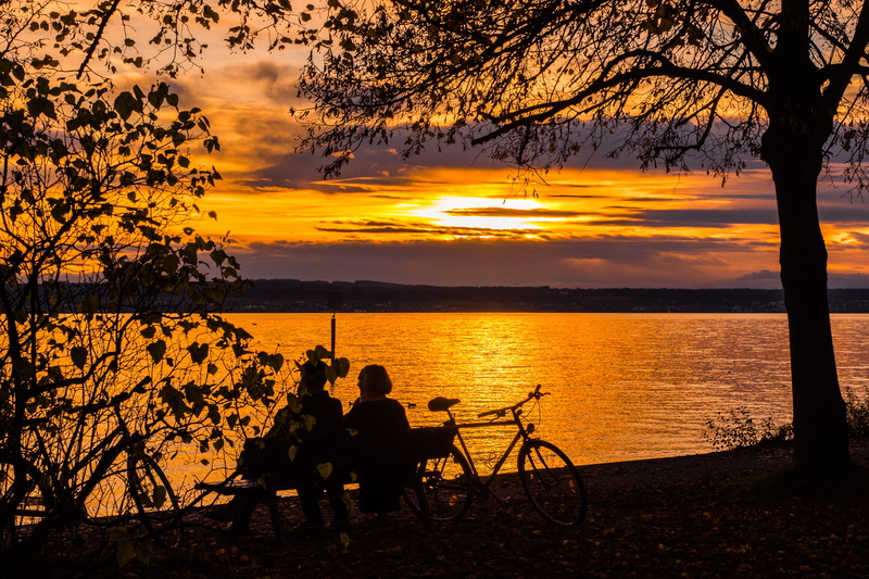 bank, sunlight, men, more, pair, beauty in nature, tranquil scene, bicycle tour, scenics - nature, lake, Water, Lake, mood, Sunset, human, photo, couple