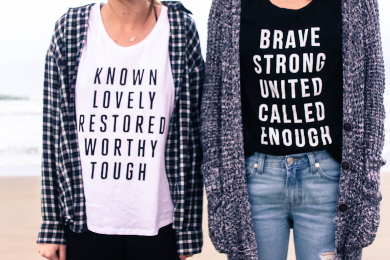 western script, protestor, teenager, shirts, enough, social issues, men, lovely, tough, ocean, standing, women, called, people, protest, midsection, holding