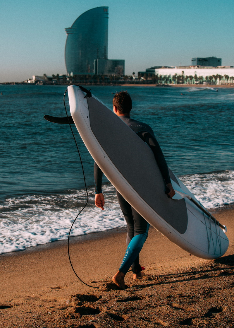 beach, looking at view, outdoors, carrying, surfer, one person, real people, white, sand, beauty in nature, surfboard, ocean, rear view, seashore, full length