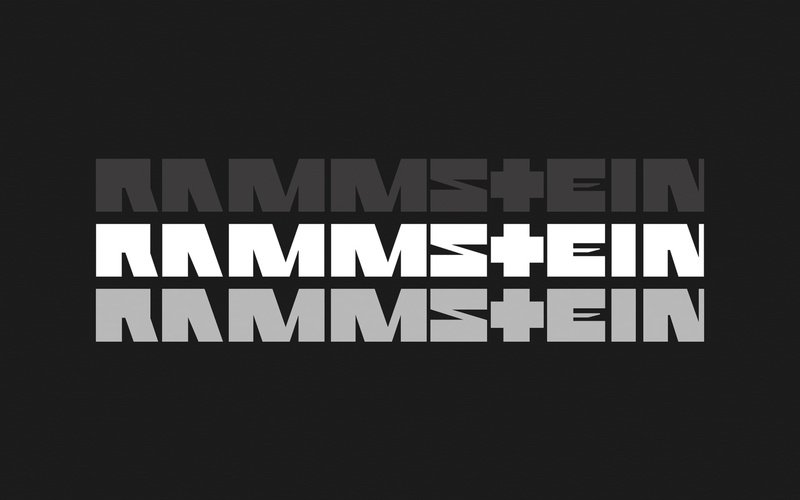 the inscription, black background, copy space, architecture, single word, Rammstein, studio shot, dark, illuminated, no people, capital letter, indoors