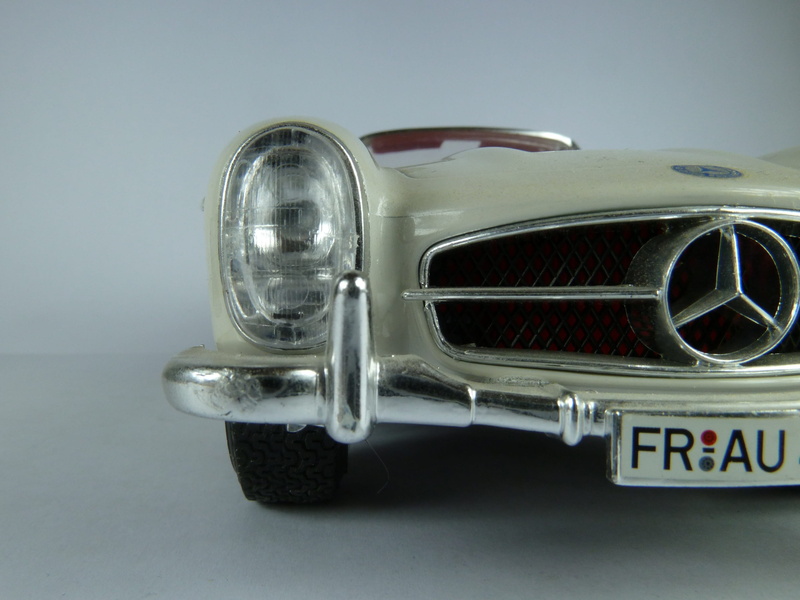 mode of transportation, 300 sl, corvertible, silver colored, bburago, single object, gray background, model car, studio shot, nostalgia, vintage car, transportation