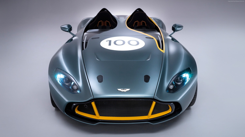 headwear, car, studio shot, no people, metal, technology, 2K, safety, single object, Aston Martin CC100 Speedster, gray, indoors, front view, black background
