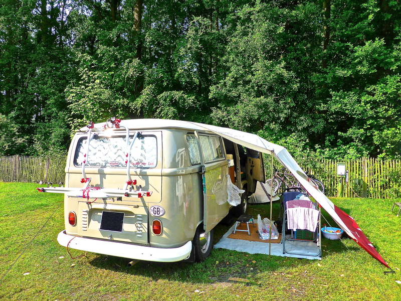 land vehicle, men, growth, lifestyles, males, volkswagen, camping, people, adult, green color, land, full length, field, nature, outdoors, bus, motorhome