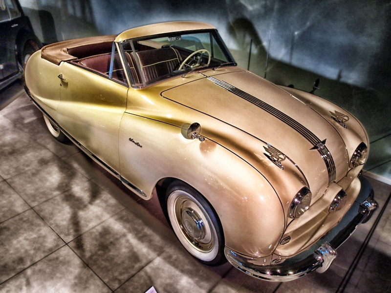 automobile, convertible, days gone by, retro styled, car, oldster, chrome, machine, antique, vehicle, indoors, gray, shiny, metal, wall, auto, high angle view
