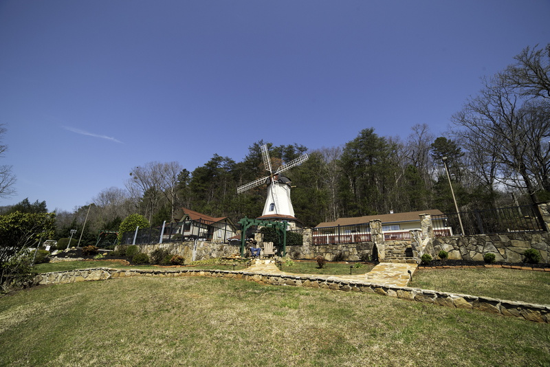 cross, religion, plant, day, alternative energy, turbine, outdoors, landscape, cultures, house, public domain, helen, architecture, sky, georgia, no people