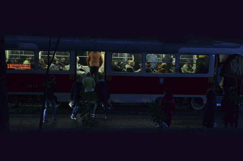 real people, adult, women, men, city, public transportation, land vehicle, group of people, dark, kyiv, mode of transportation, tram, outdoors, public