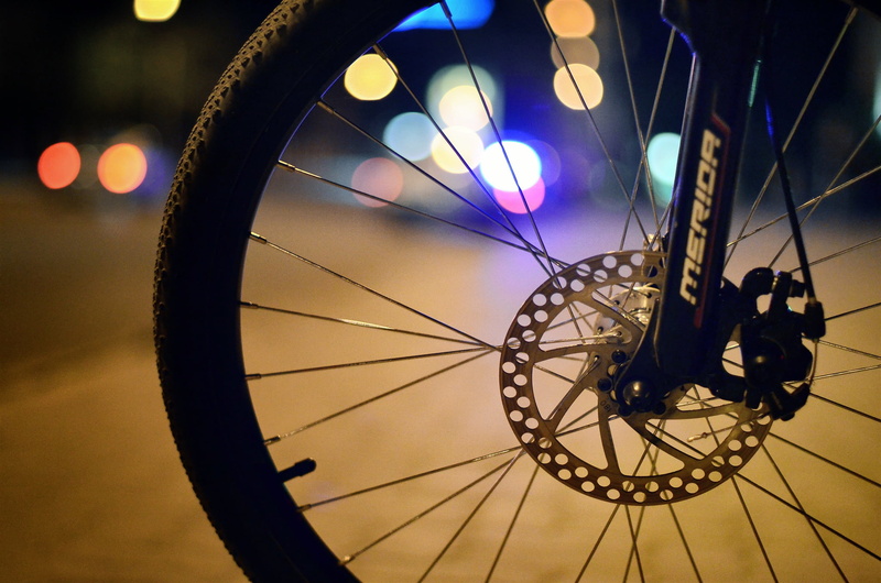 pedal, outdoors, DISK, bicycle, close-up, no people, shape, lighting equipment, land vehicle, spoke, nature, transportation, focus on foreground, BRAKE
