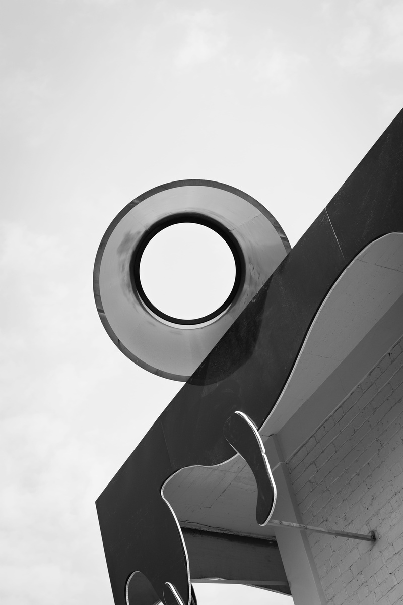 curve, nature, machine, tape, transportation, design, sky, symbol, cloud - sky, indoors, text, building exterior, focus on foreground, connection, metal