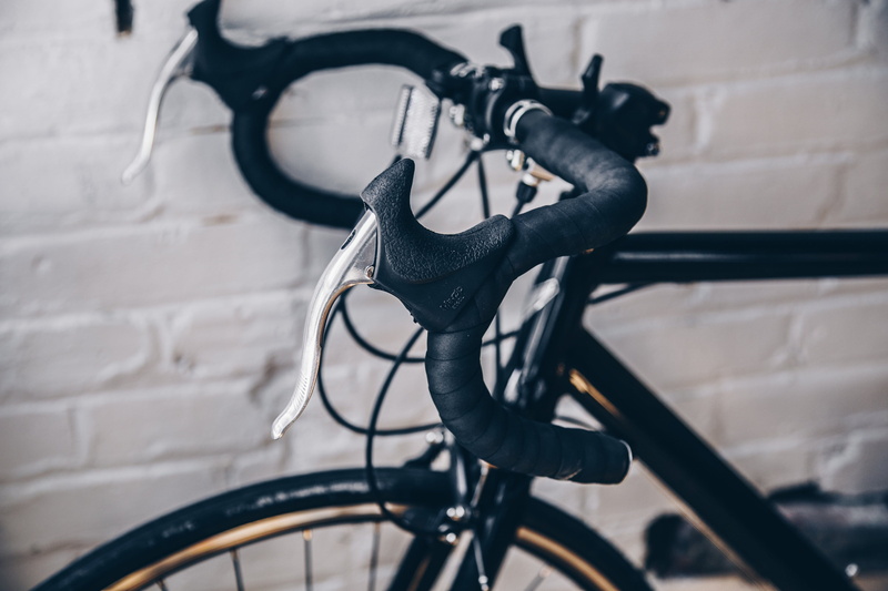 white color, day, equipment, 4K, no people, land vehicle, handle, brakes, seat, recreation, industry, transportation system, close-up, indoors, bicycle