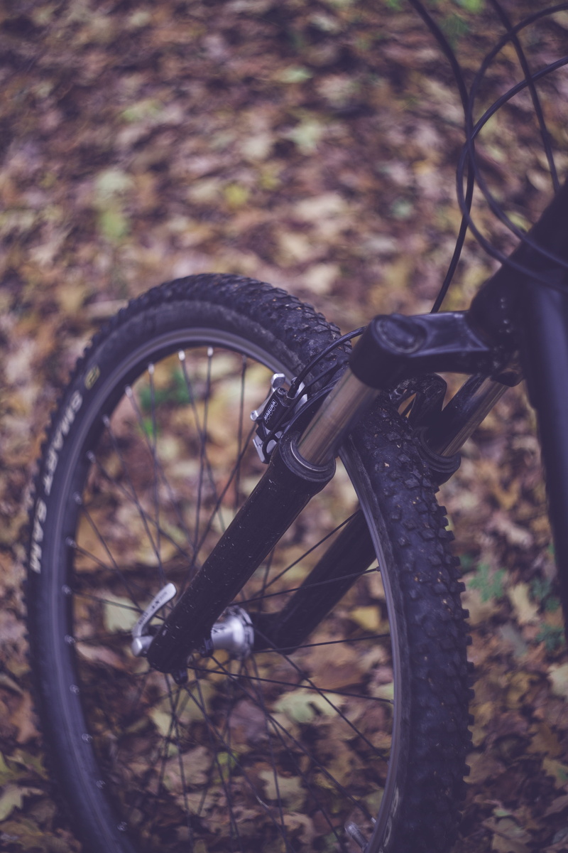 blur, field, day, transportation system, transportation, tree, countryside, brake, land, colorful, daylight, selective focus, green, bike, focus on foreground