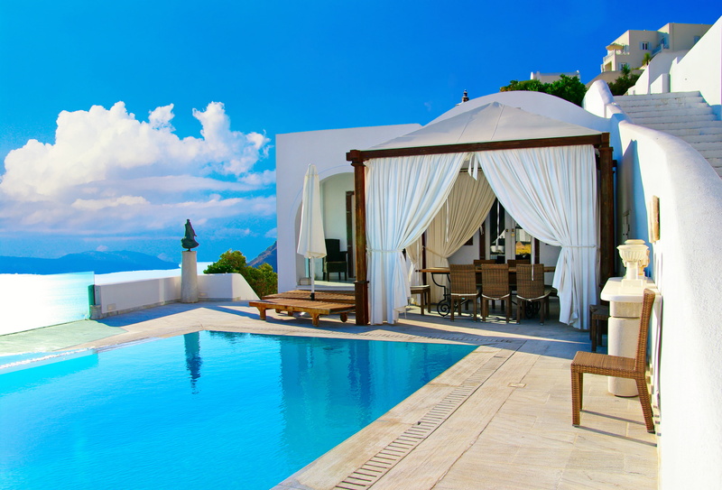 comfortable, building exterior, island, vacations, built structure, sunlight, poolside, home, outdoors, lounge chair, nature, tranquil Scene, swimming Pool