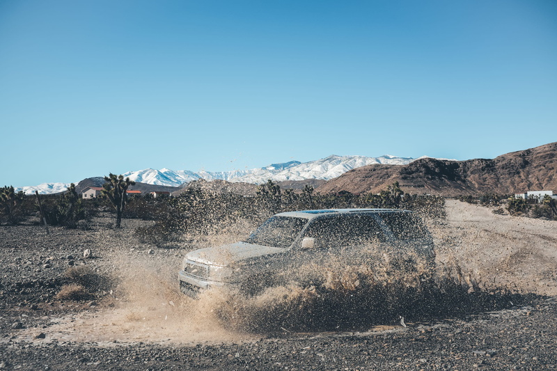water, no people, offroading, 2K, dust, motor vehicle, desert, clear sky, mud, blue, off road, motion, transportation, road, mountain, mode of transportation