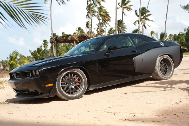 motor Vehicle, outdoors, wheel, sky, beach, sports Car, no People, sunlight, speed, engine, mode of Transport, stationary, mode of transportation, nature