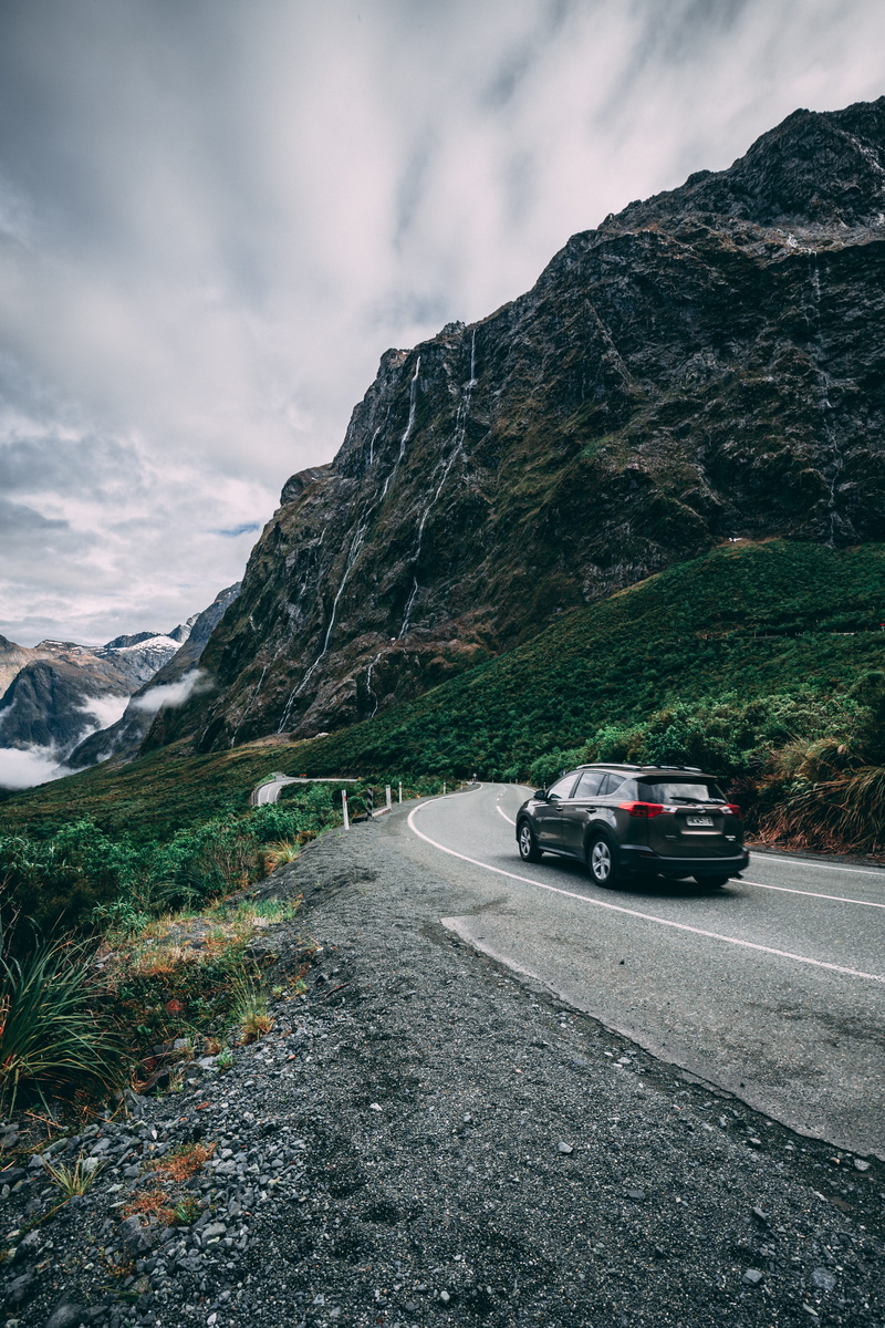 sports car, scenics - nature, outdoors, rocky mountain, towards, beauty in nature, near, mode of transportation, idyllic, mountain, black, nature, rock
