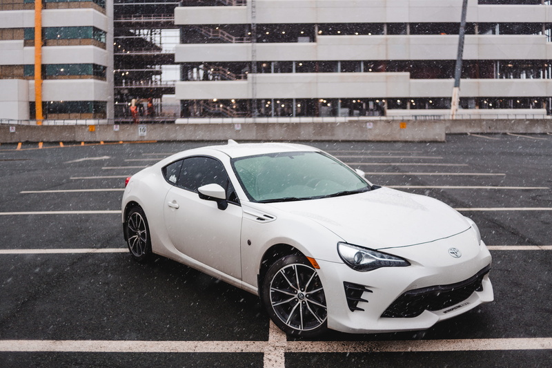 snow, gt, architecture, road marking, stationary, sports, building, mode of transportation, white, motor vehicle, land vehicle, white color, no people