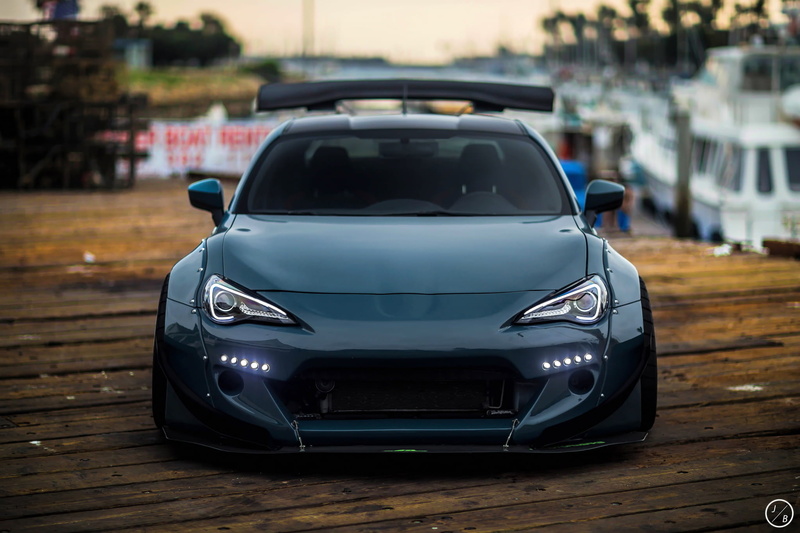 parking lot, luxury, city, mode of transportation, car, urban Scene, focus on foreground, parking, new, mode of Transport, land Vehicle, outdoors, wheel