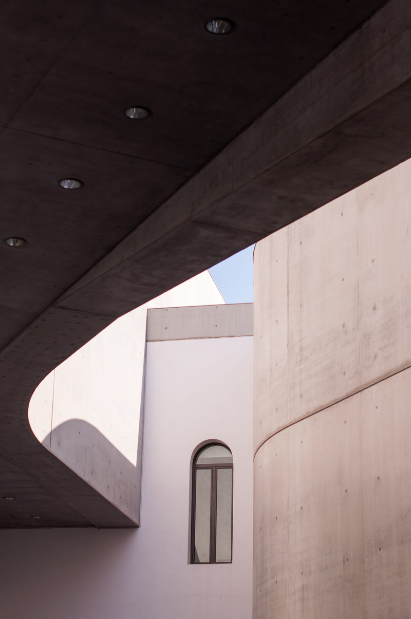 no people, built structure, contemporary art, geometric shape, contrast, low angle view, outdoors, wall, sunlight, shape, city, Maxxi, wall - building feature