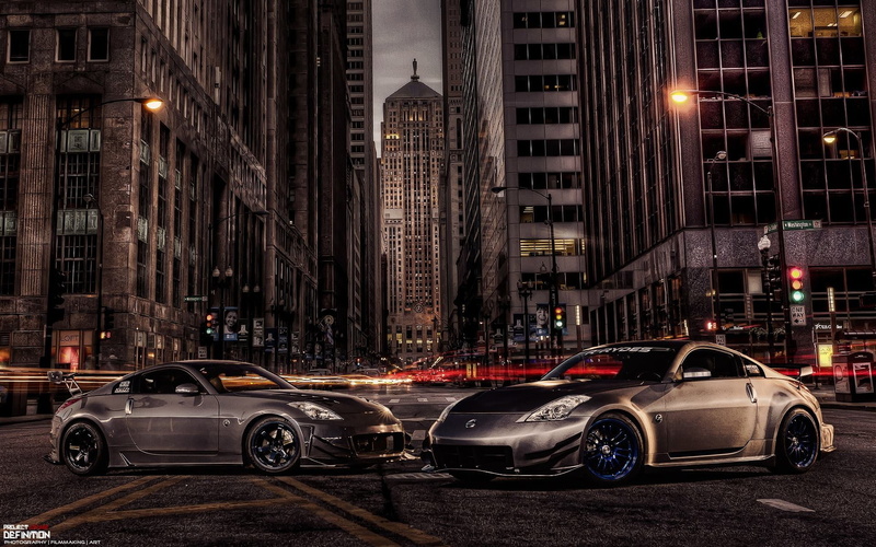 building exterior, car, nissan 350z, the city, illuminated, city street, office building exterior, tuning, night, built structure, on the move, architecture