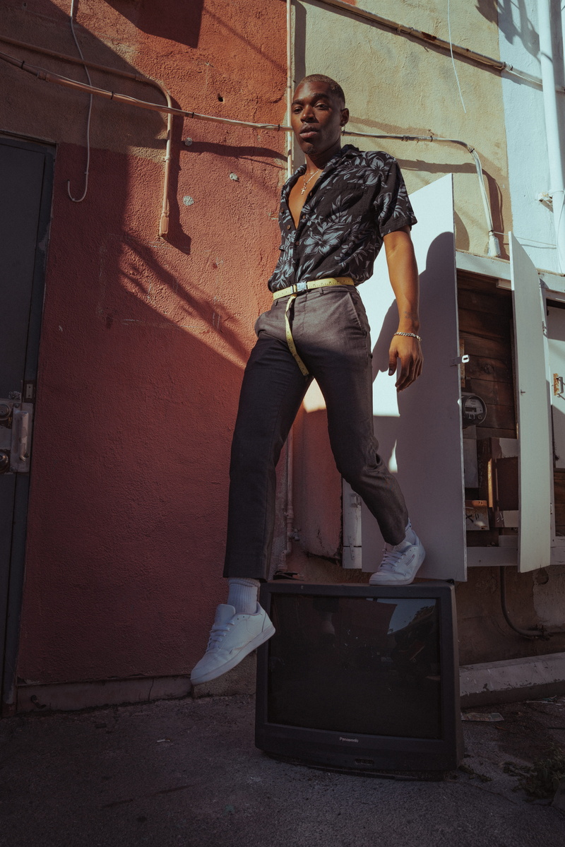 crt, alley, 8K, wall - building feature, jeans, lifestyle, building exterior, tv, lifestyles, front view, concrete, person, city, black, near, outdoors