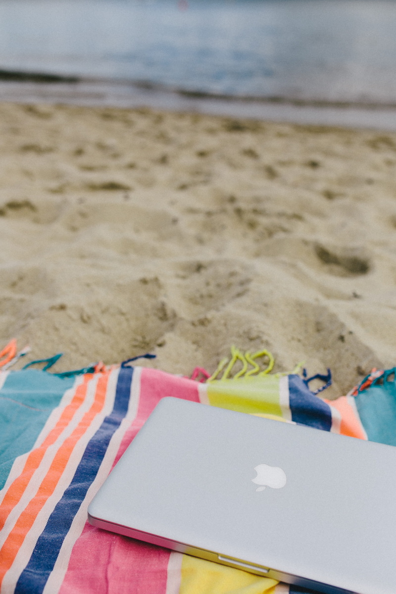 focus on foreground, close-up, day, together, tech, sea, computer, holiday, travel Destinations, summer, nature, laptop, water, book, publication, sand