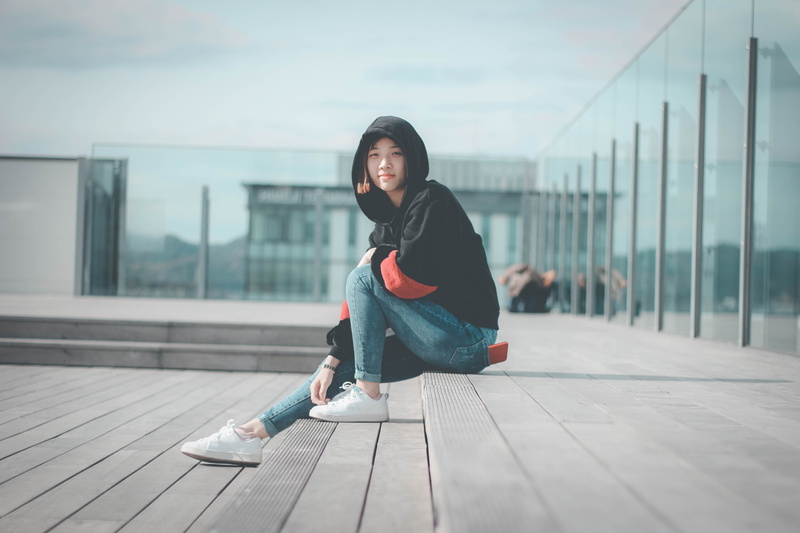 young, leisure activity, built structure, lifestyles, women, landscape, portrait, building exterior, hoody sweater, city, hoodie, young adult, hairstyle