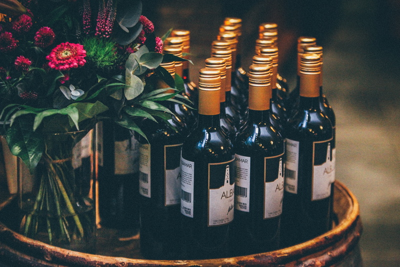 still life, close-up, black, large group of objects, wine, side, freshness, wooden, arrangement, business, wine bottle, no people, container, flowers, bouquet