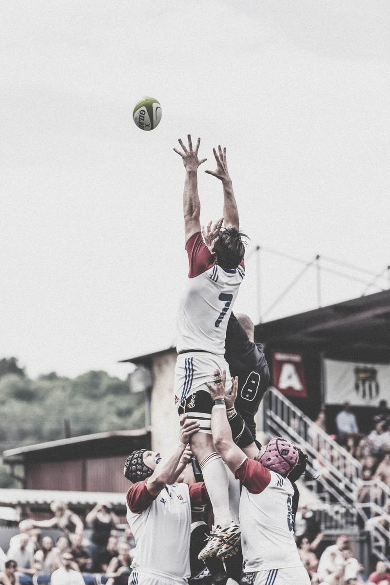 sky, catching, lifestyles, throwing, hand, effort, clothing, fun, sport, athlete, ball, day, men, players, people, adult, athletes, competition, arms raised