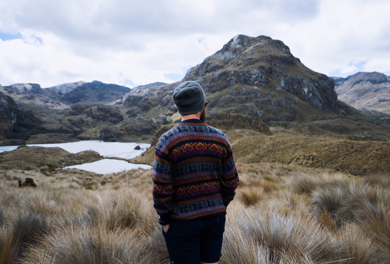 human, scenics - nature, land, hat, warm clothing, bermuda, rear view, shorts, standing, plant, cap, lifestyles, cloud - sky, looking at view, sweater