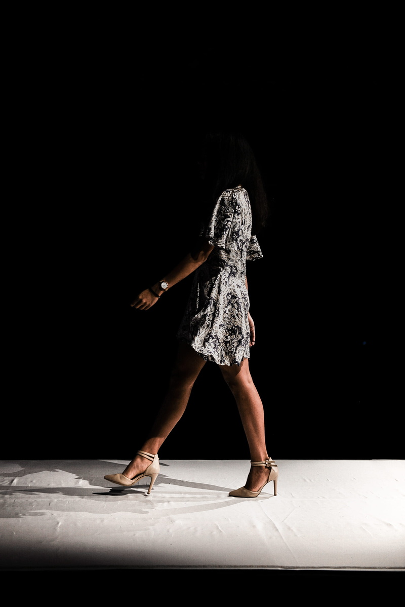 modelling, walking, 2K, balance, dress, spotlight, performance, inside, copy space, mini, wearing, black background, model, stage, stage - performance space