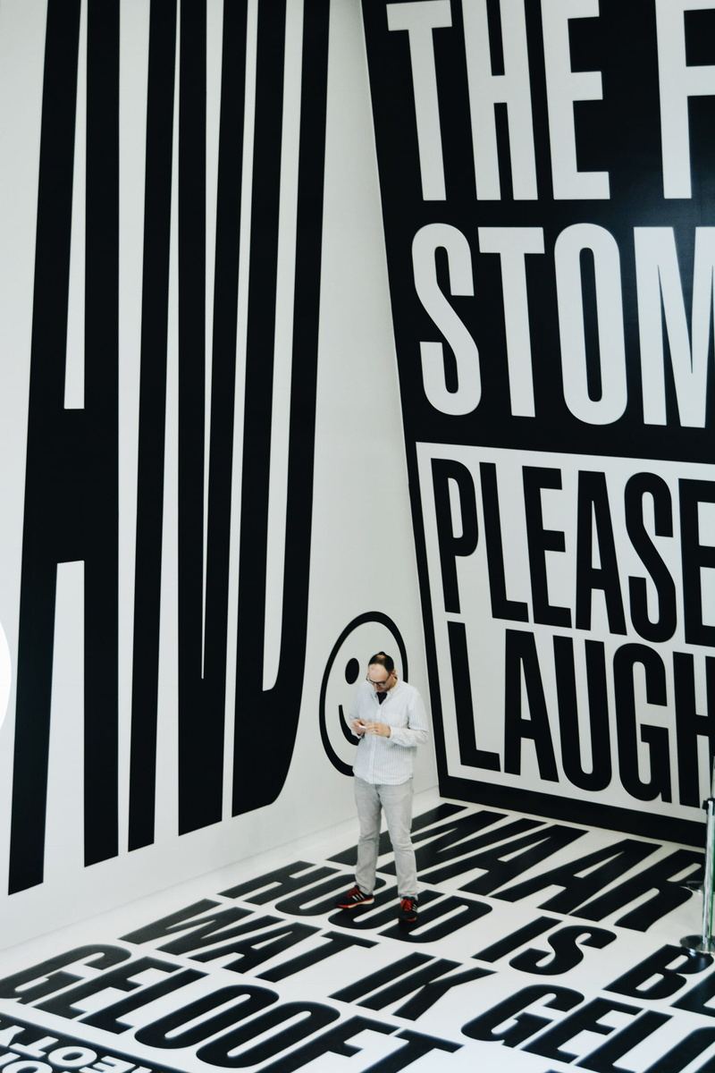 astronaut, day, text, western script, indoors, laugh, portrait, letters, striped, communication, real people, standing, amsterdam, innocence, museum