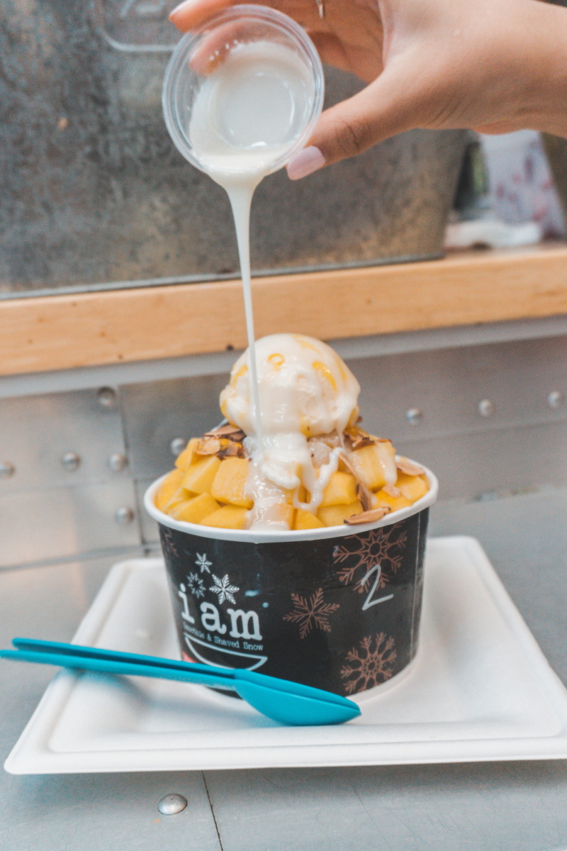 glass, body part, yum, real people, united states, holding, dairy product, finger, one person, mangobingsoo, frozen food, tray, mangos, lifestyles